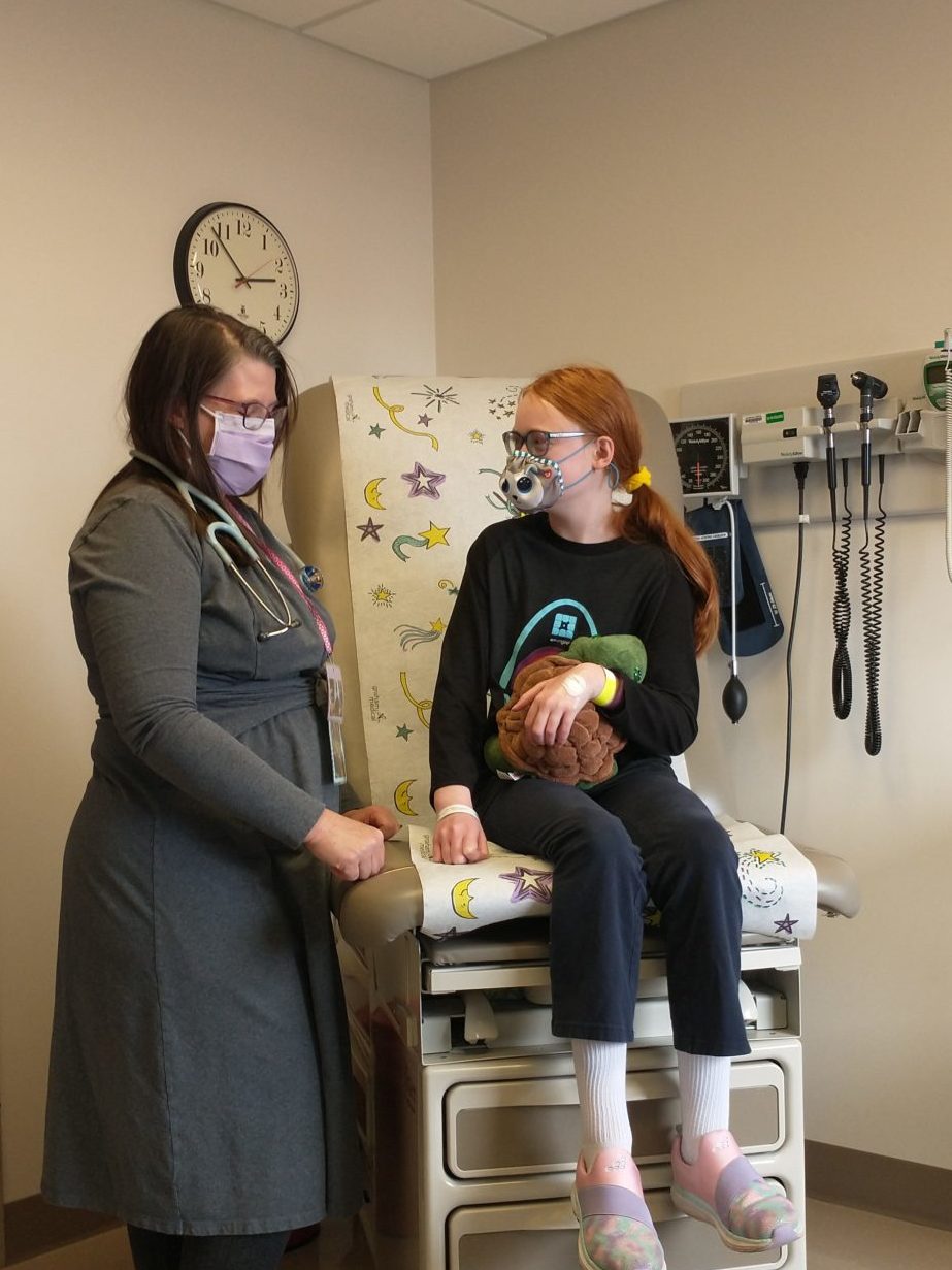 Dr. McNall and Joanna talking in the exam room.